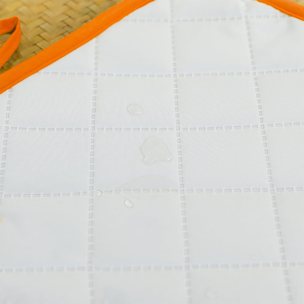 Mobile Wickelunterlage aus Bio-Baumwolle Erdbeerfarbe