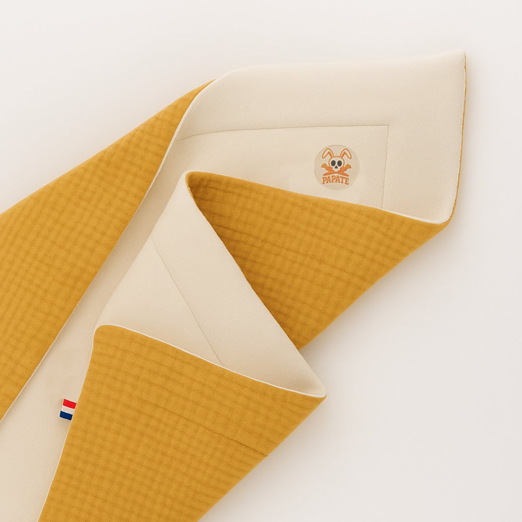 Decke aus Bio-Baumwolle in Honigfarbe und Weiß