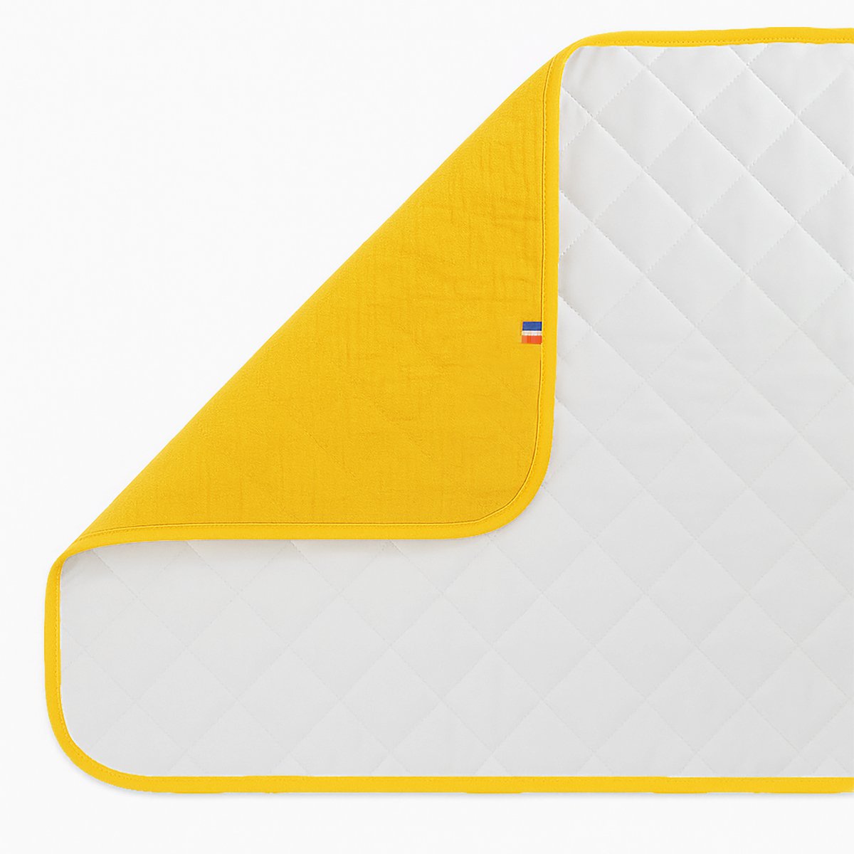 Mobile Wickelunterlage aus Bio-Baumwolle Honigfarbe