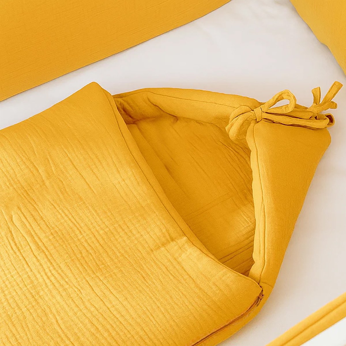 Babynest aus honigfarbener Bio-Baumwolle