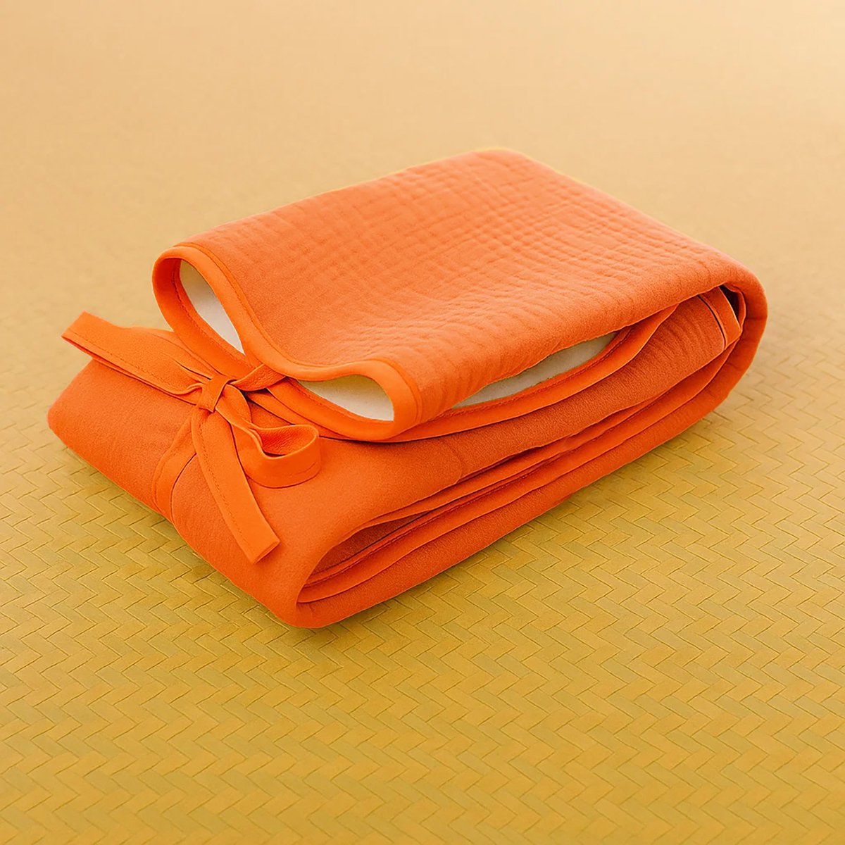 Mobile Wickelunterlage aus Bio-Baumwolle Erdbeerfarbe