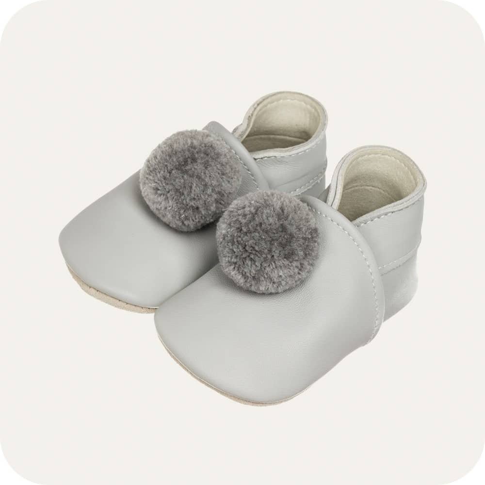 Babyschuhe mit Pompons Grau